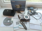 CCD digital camera showing 3 inch LCD screen and mode dial