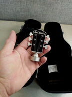 Open guitar-shaped gift case with black velvety lining and bottle compartment – detail 6
