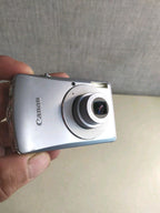 Canon Digital IXUS 65 front view with lens