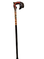 Detailed raven head handle with feather texture on a wooden cane – detail 5