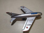 Vintage Soviet toy jet with blue-painted canopy and red star on the tail fin – detail 8