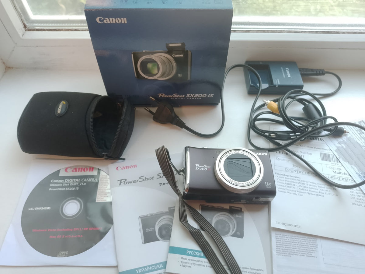 TESTED digital camera CANON PowerShot SX200 IS 12.1 MP, black, (full set). Japan