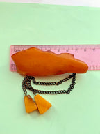 Large Soviet brooch with decorative chains and two amber pendants