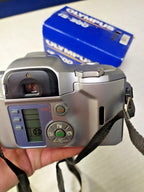 Olympus IS-500 film camera with built-in flash and quartz date back