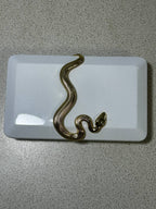 Kilian Paris white lacquer clutch case with gold 3D snake across the lid