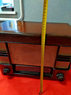 Original speaker cloth and knobs on 1950s Soviet radio receiver – detail 10