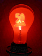 Vintage neon glow lamp lit with orange-red glow outlining a factory and the number 50 – detail 8