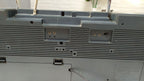 Chip on the top corner of the 1980s ghetto blaster casing – detail 10