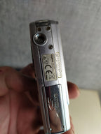 Sanyo VPC-E760EX box, charger, cables, CD-ROM and manual – detail 10