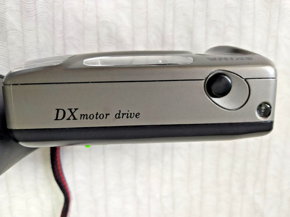 Lens Made in Japan inscription on the front of a Skina SK-222