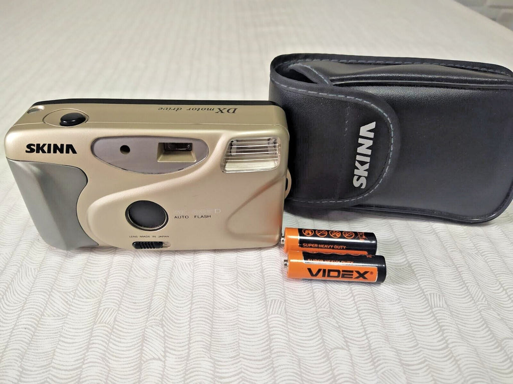 Vintage Skina compact camera with auto flash and red-eye reduction
