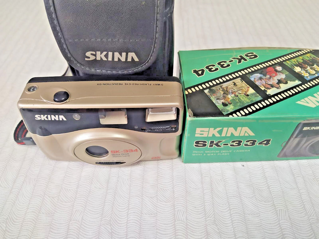 Skina SK-334 35mm point and shoot film camera in champagne gold with original box