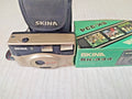 Skina SK-334 35mm point and shoot film camera in champagne gold with original box