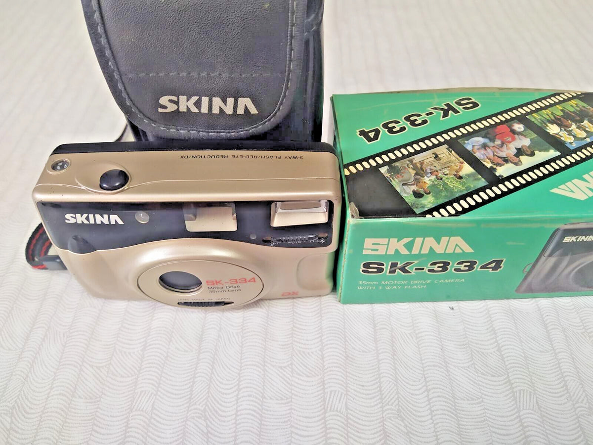 Skina SK-334 35mm point and shoot film camera in champagne gold with original box