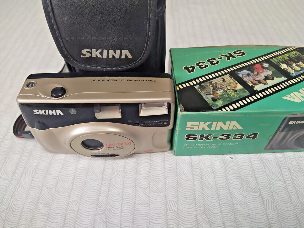 Skina SK-334 with original soft case and wrist strap