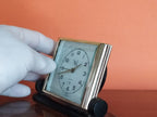 Soviet desk clock with Young Pioneer boy blowing a bugle on the dial