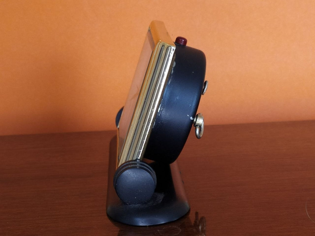 Rear controls of Slava alarm clock with wind keys and speed lever – detail 6