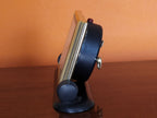 Rear controls of Slava alarm clock with wind keys and speed lever – detail 6