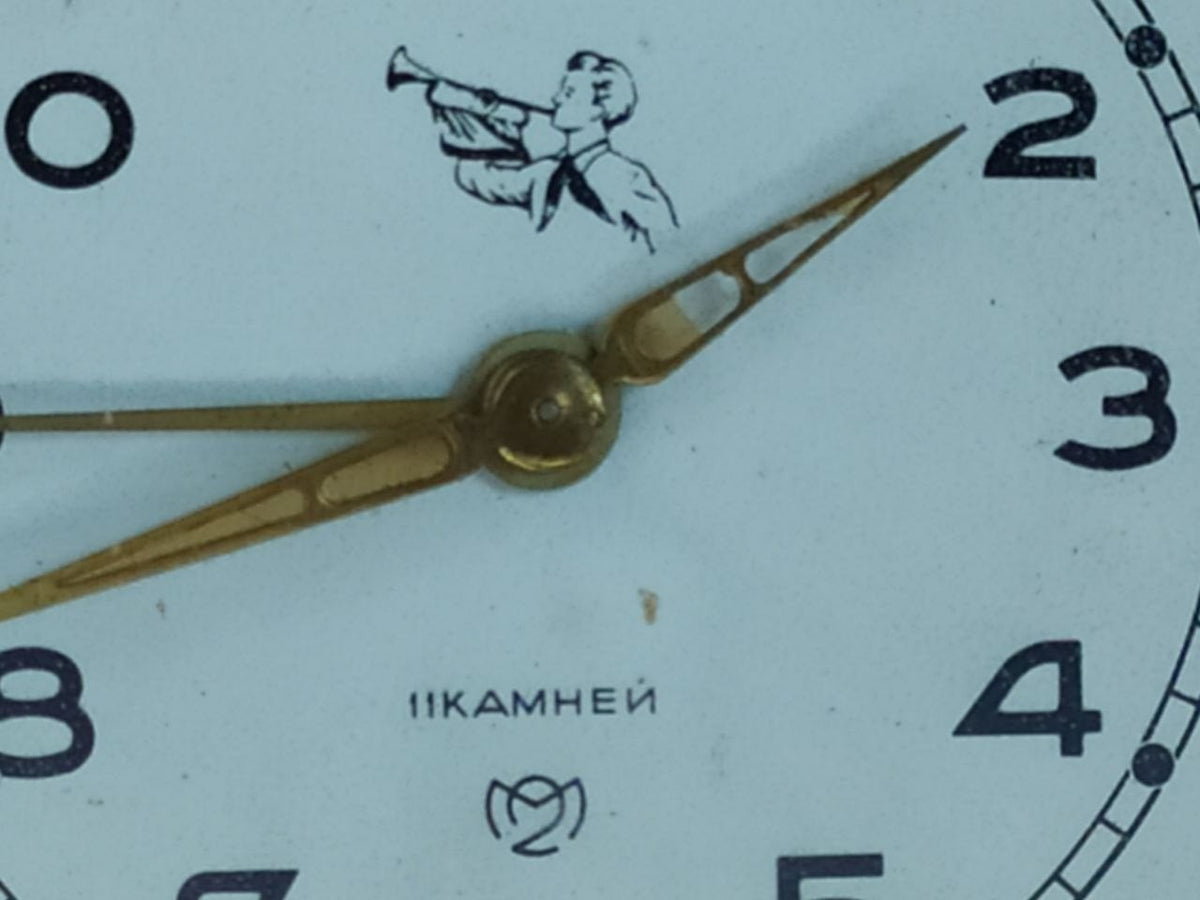 Rear controls of Slava alarm clock with wind keys and speed lever – detail 9