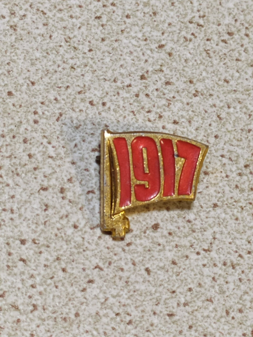 USSR red flag pin with 1917 date, front view