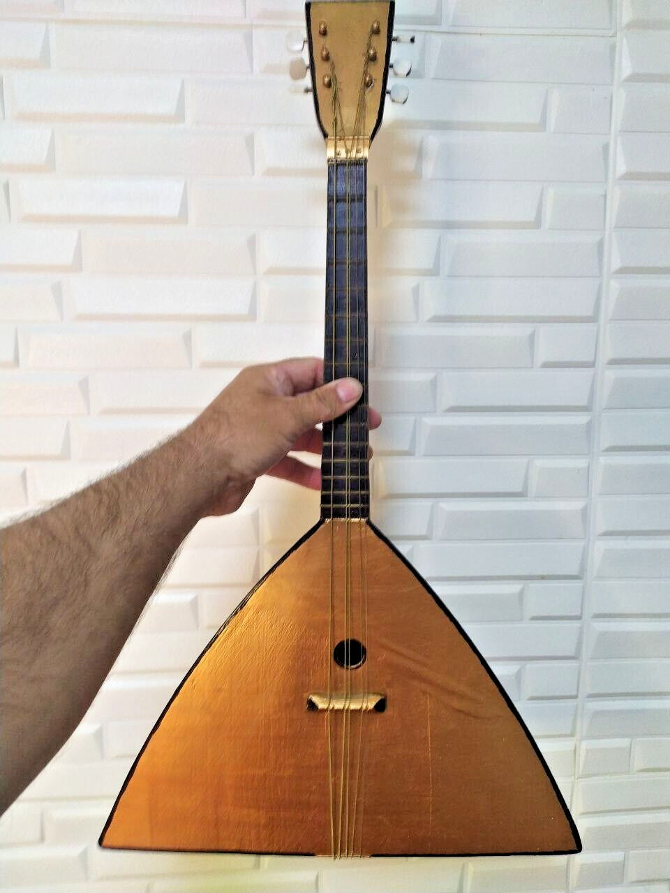 Gold-painted top and back on a Soviet folk instrument – detail 9