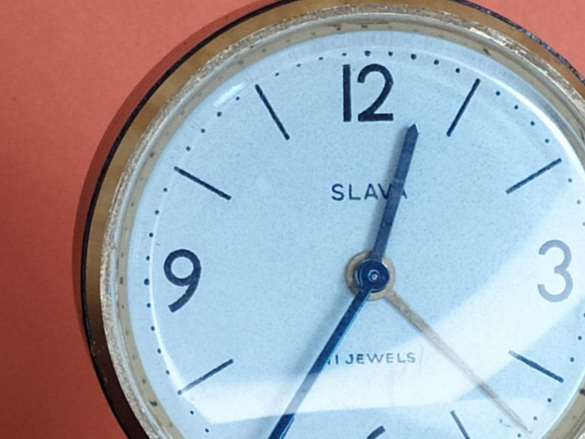 Slava alarm clock showing patina on brass parts – detail 10