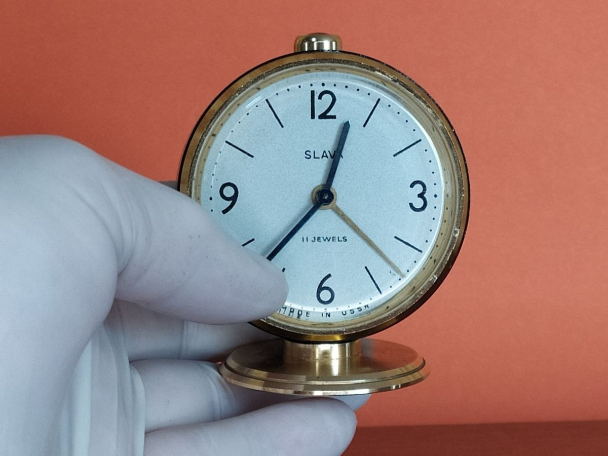 Mechanical Soviet alarm clock with gold-colored stand and matte black case – detail 12