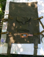 Leather ID tag holder with clear window on a USSR military backpack