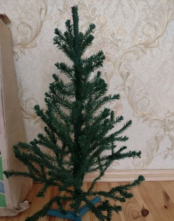 Vintage Soviet tabletop Christmas tree with green PVC needles and wire branches