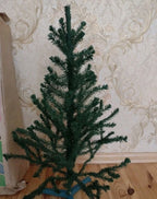 Vintage Soviet tabletop Christmas tree with green PVC needles and wire branches