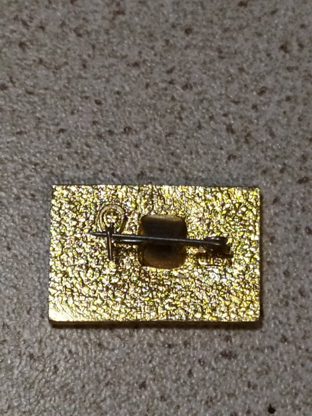 Soviet anniversary pin with cruiser Aurora design
