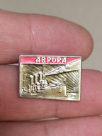 Soviet Aurora cruiser pin badge in aluminum and enamel, naval history theme
