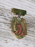 Vintage USSR festival pin with lyre emblem, front view