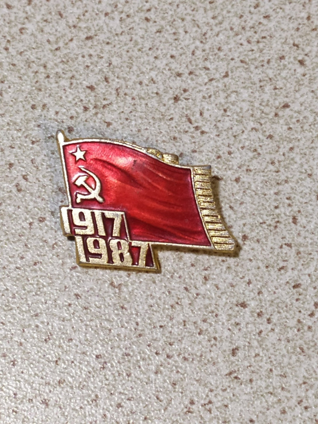 Soviet badge for the 70th anniversary of the October Revolution, 1917-1987, red flag