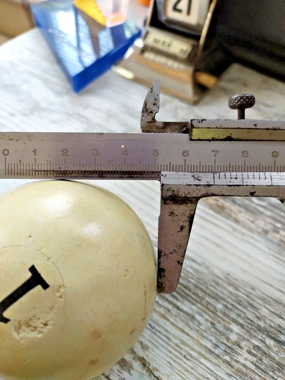 Close-up of recessed number 1 on the Soviet billiard ball – detail 13