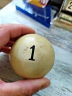 Close-up of recessed number 1 on the Soviet billiard ball – detail 7
