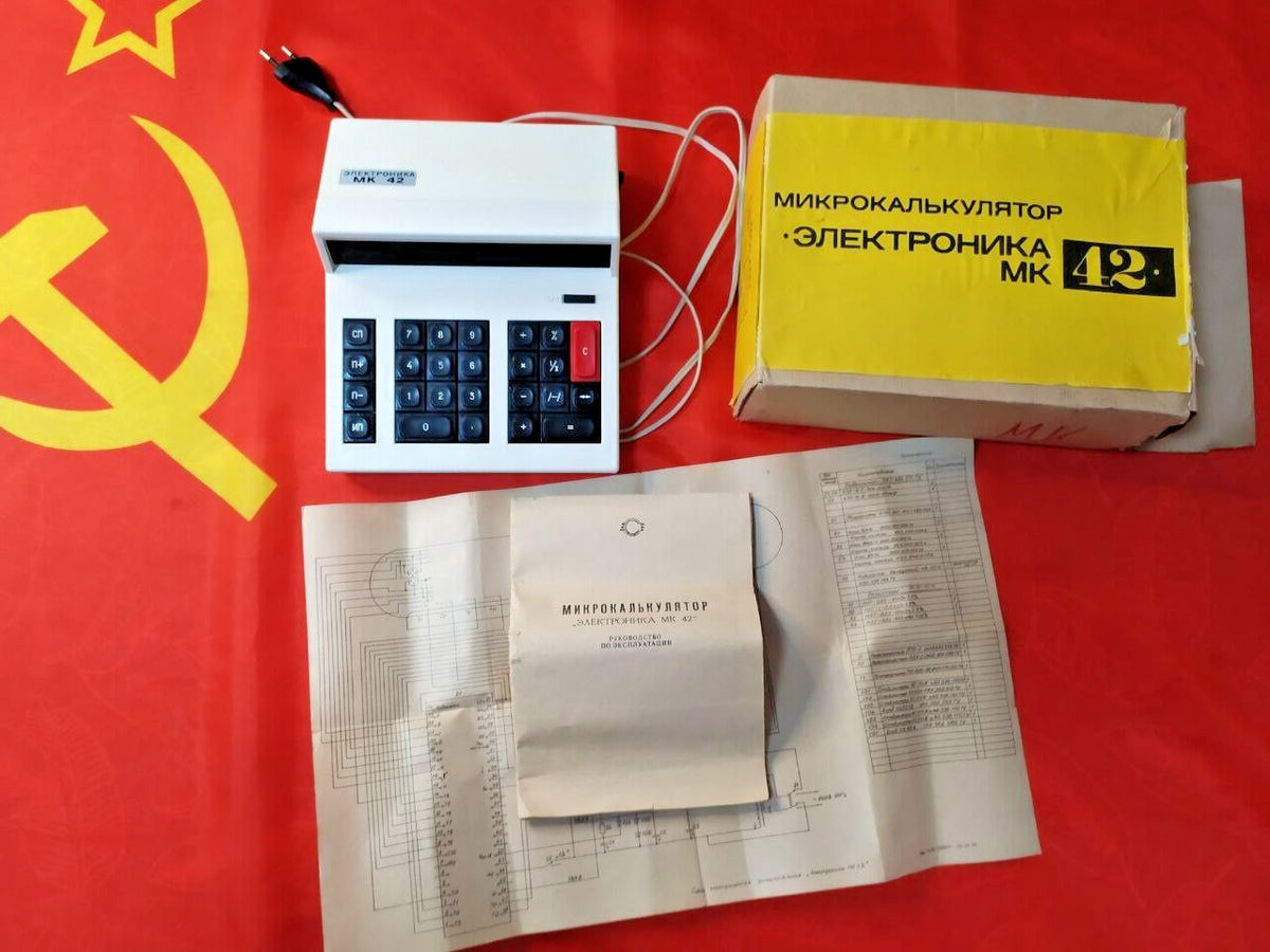 Soviet calculator Elektronika MK-42 with green vacuum fluorescent display and original box