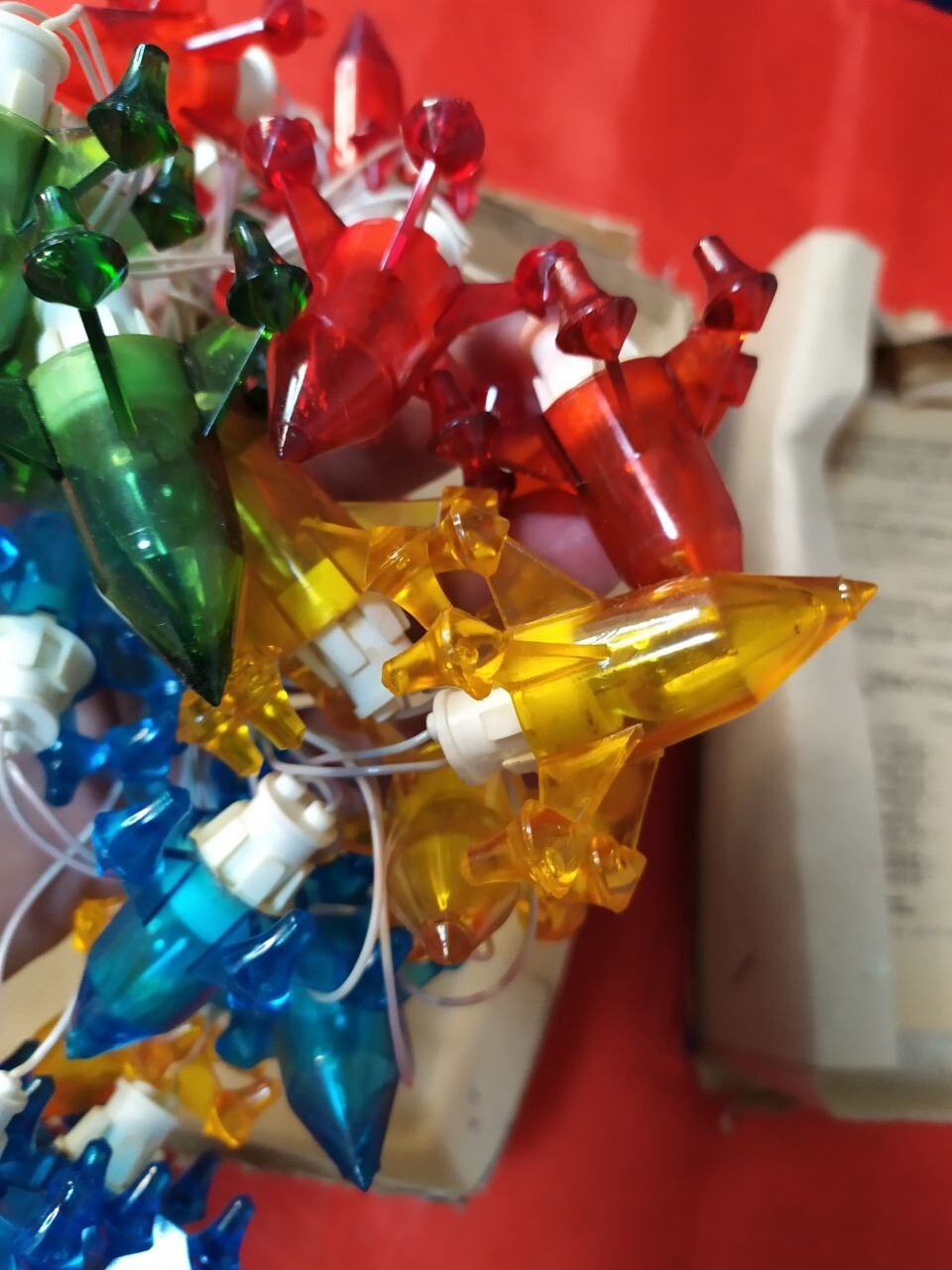 Plastic rocket light covers on the Soviet space themed holiday garland – detail 19