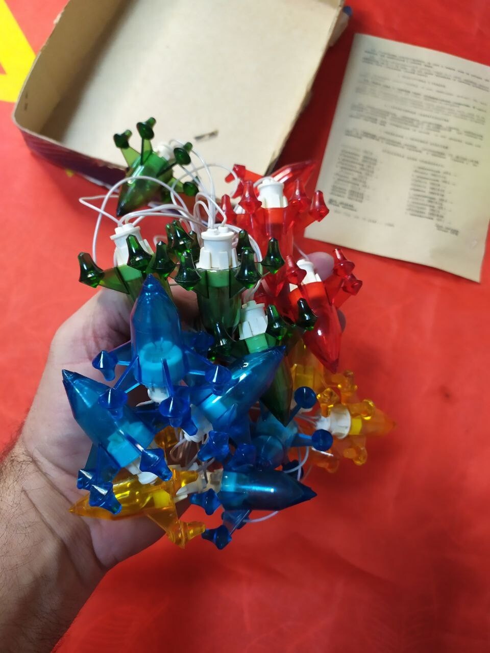 Plastic rocket light covers on the Soviet space themed holiday garland – detail 7