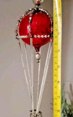 Russian Christmas ornament with glass rods and a small wicker-style basket