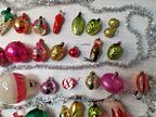 Vintage Soviet Christmas ornaments laid out, showing shapes and colors
