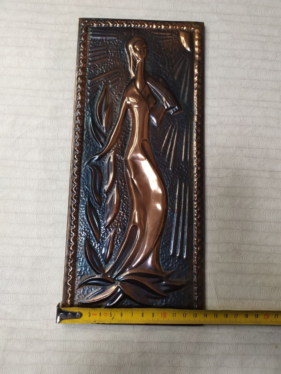 Back of Soviet wall plaque with built-in hanging hole