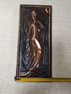 Back of Soviet wall plaque with built-in hanging hole