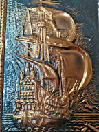 Soviet wall plaque with pre-drilled hole at the top for hanging