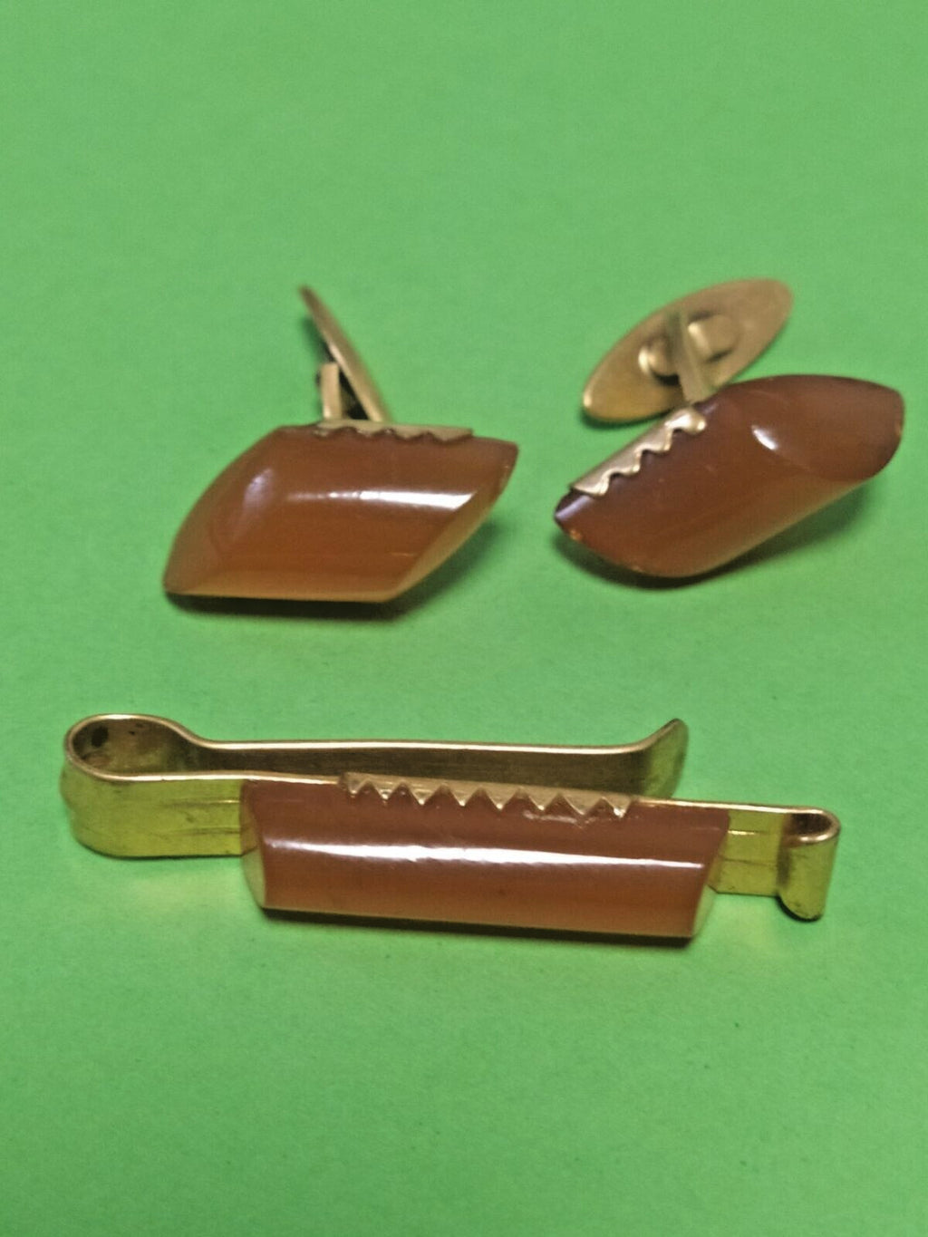 Pair of Soviet cufflinks and matching tie clip three-piece set