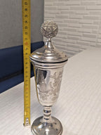 Floral engraving and natural patina on the silver-plated cupronickel cup