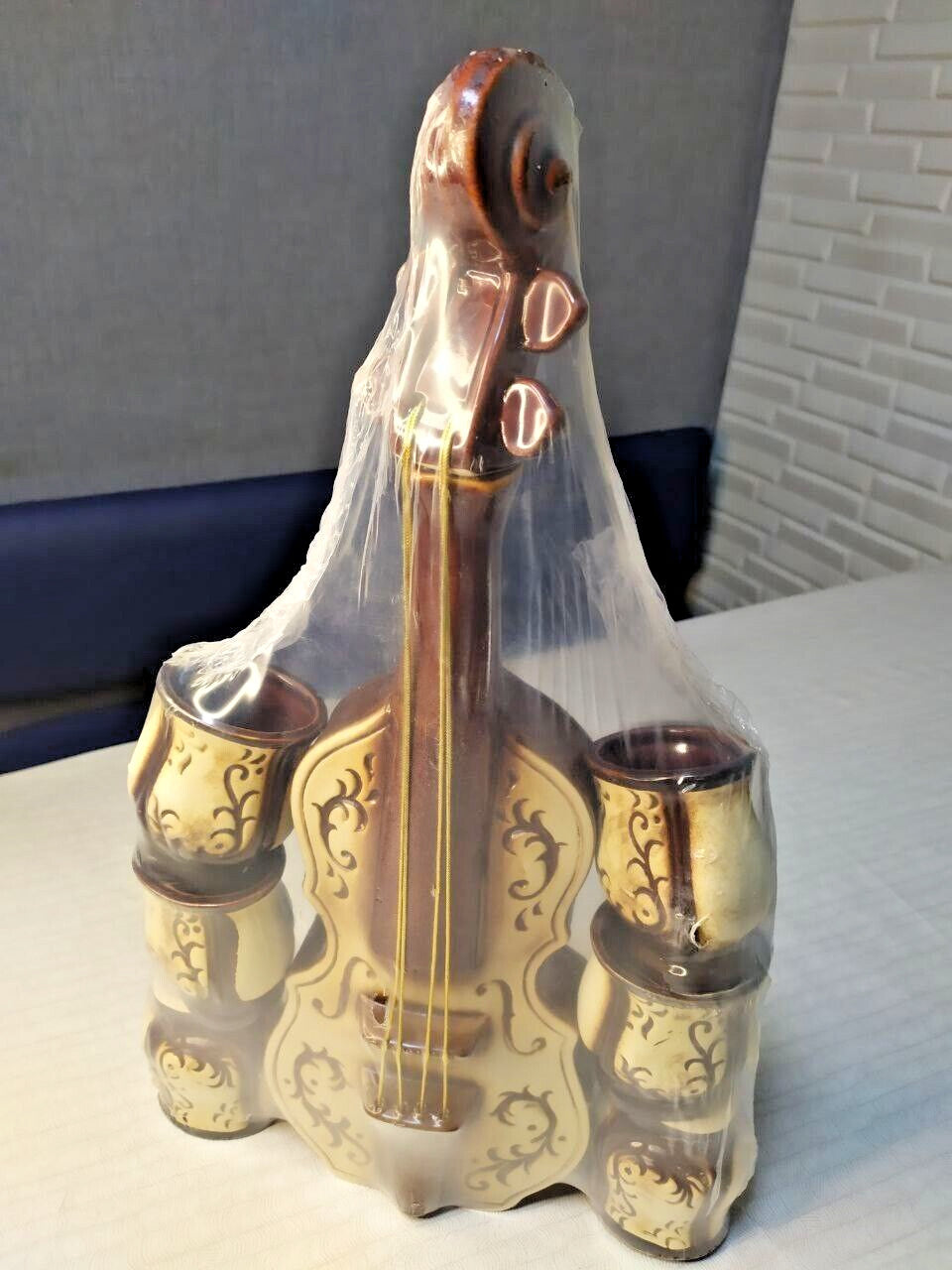 Ceramic decanter with cups fitted around the sides of the violin body – detail 12
