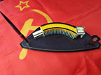 Soviet desk set shaped as the DniproHES dam with blue and yellow water flows