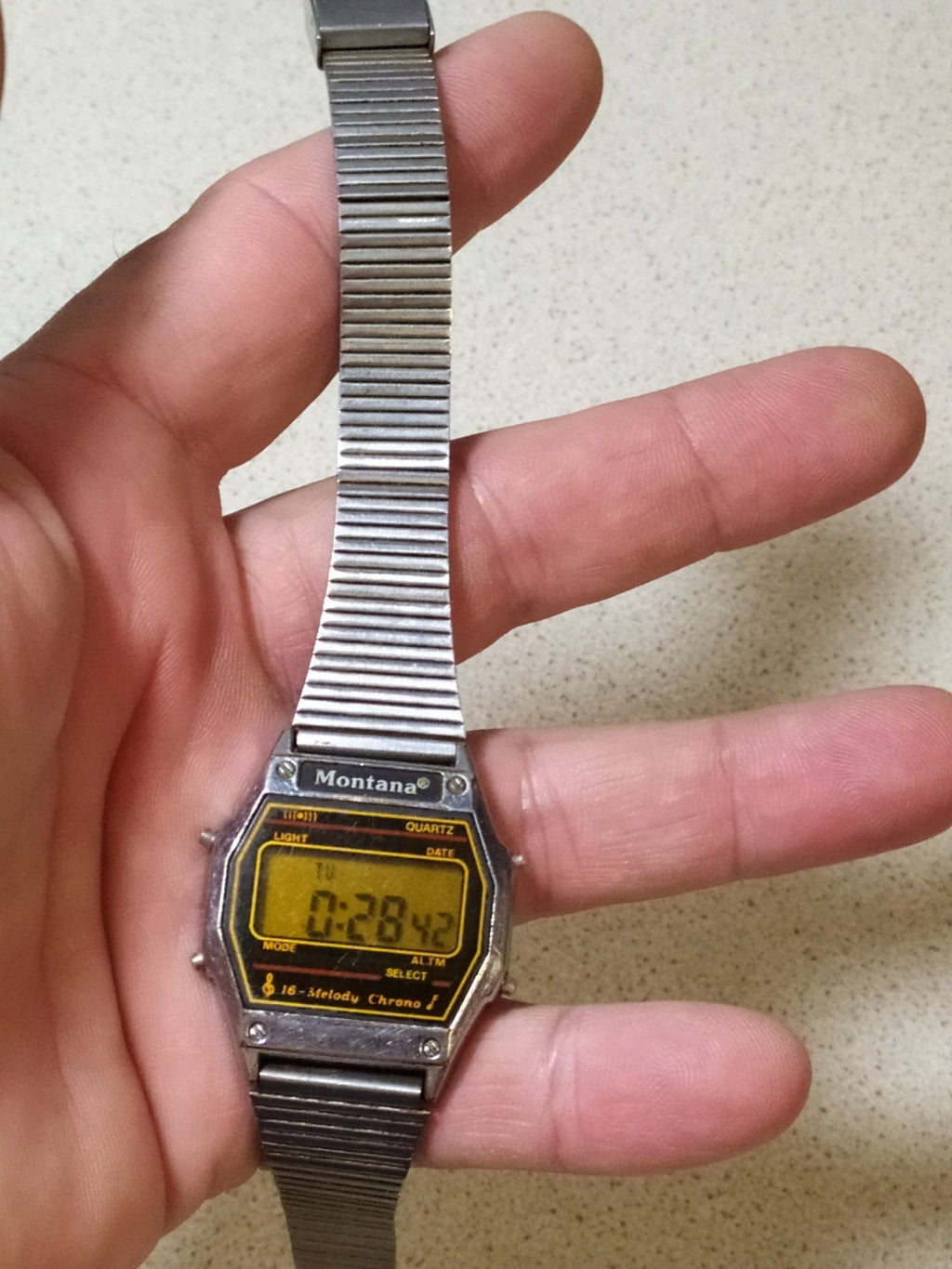 Montana digital watch face showing time and date display
