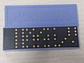 Soviet domino set with black tiles and blue plastic case engraved DOMINO
